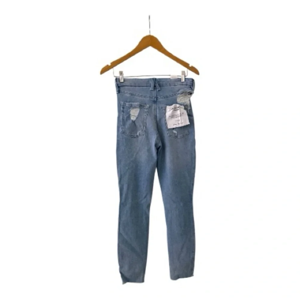 Good American high-rise skinny jeans with distressed knees and raw hem Size 2/26